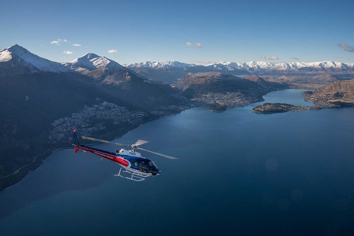 Soaring above the stunning Wakatipu basin witness majestic mountains and pristine lakes while uncovering the rich landscapes that inspired epic films. A breathtaking journey awaits.